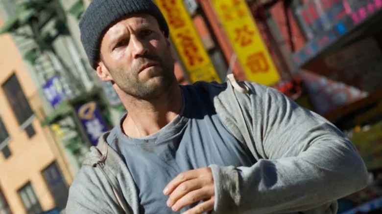 Jason Statham looks deeply concerned in a knit cap as Luke Wright in The Beekeeper