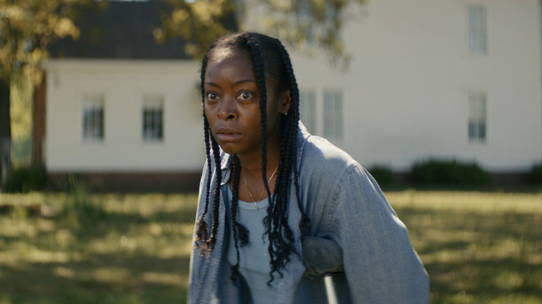 Danielle Deadwyler's Ramona fearfully approaching the woman in The Woman in the Yard