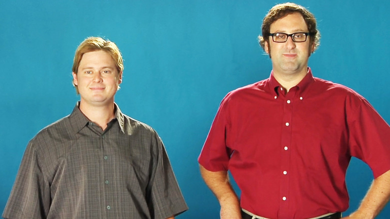 Tim Heidecker and Eric Wareheim stand side by side against a blue background in Tim and Eric Awesome Show, Great Job